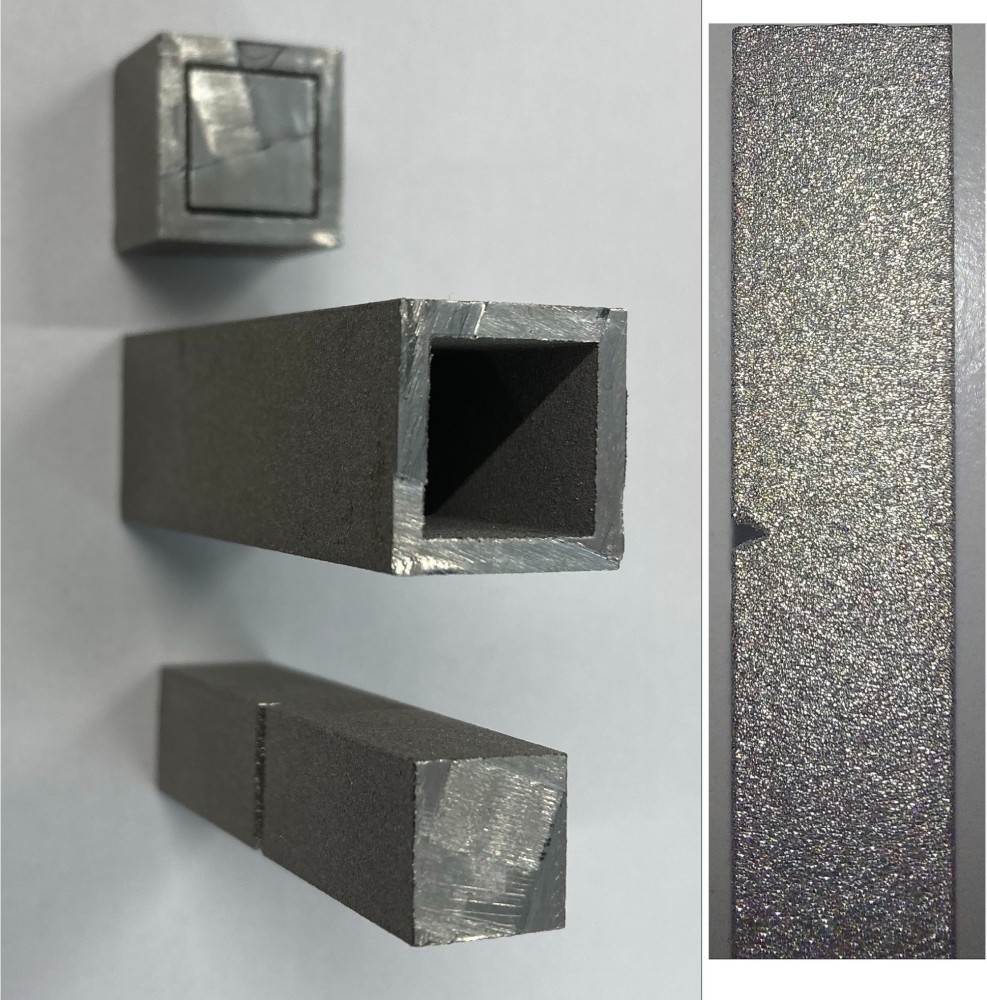 Titanium additive manufacturing component sectioned following resonance-based crack induction